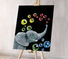 An Elephant With Colored Soapy Bubbles