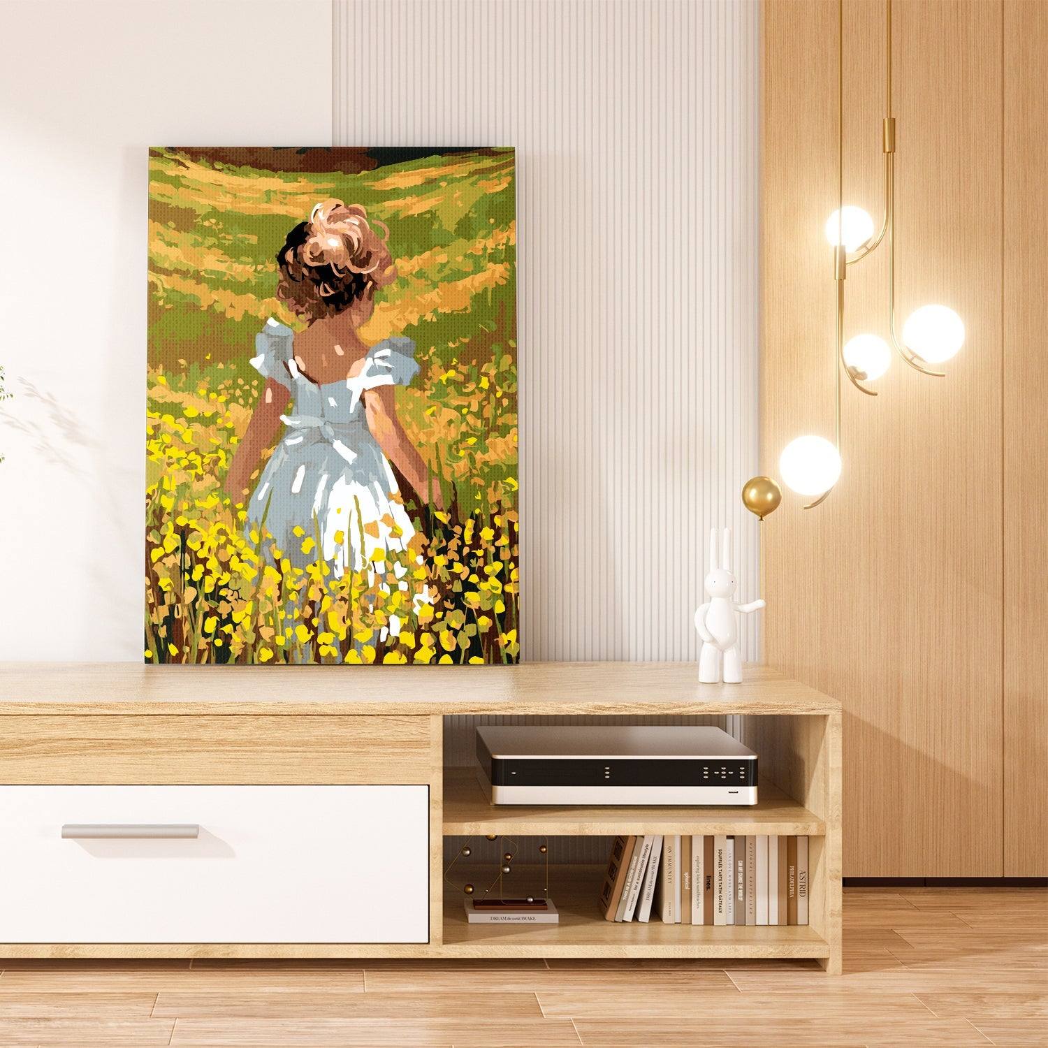 A girl on a flower meadow