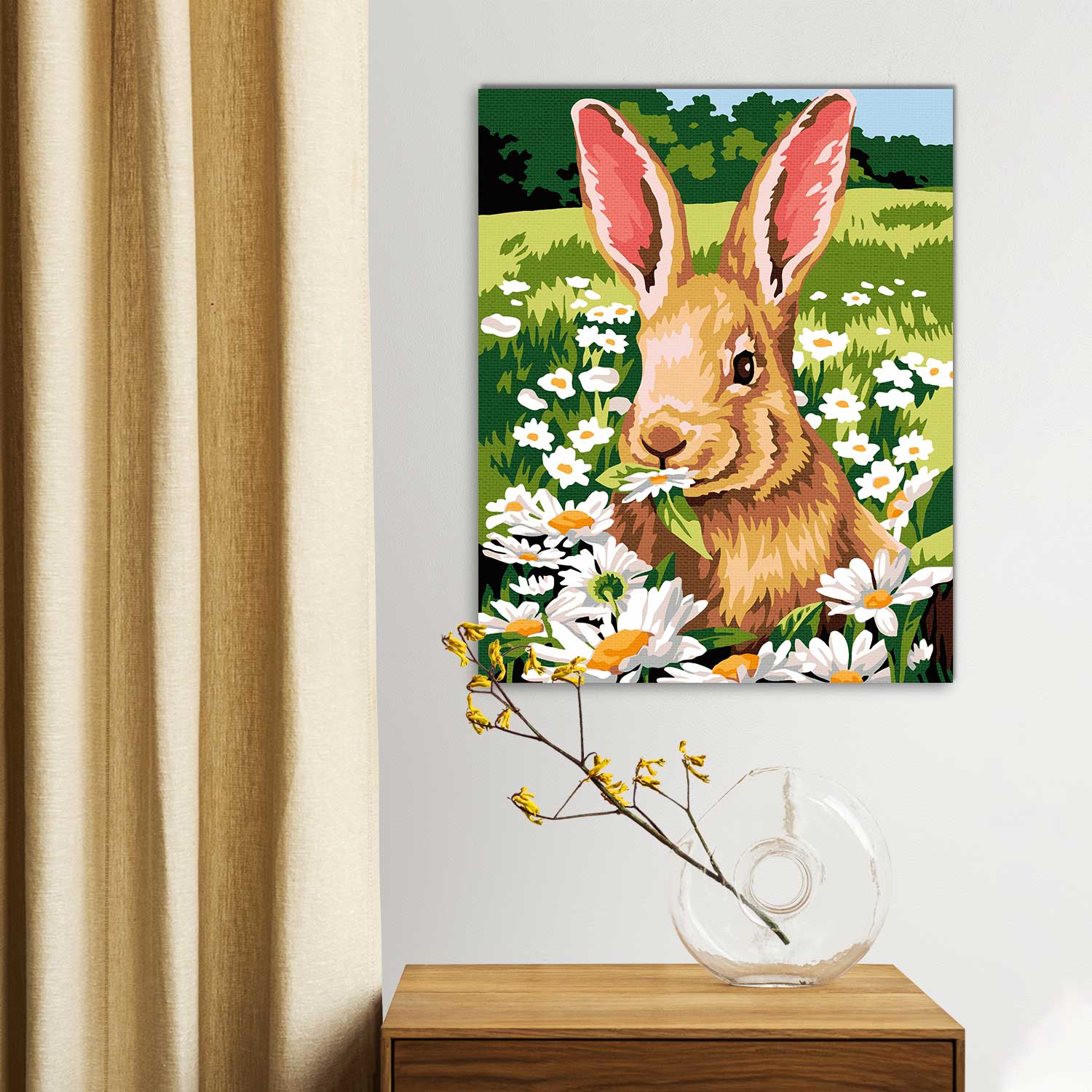 A fluffy rabbit among the chamomile